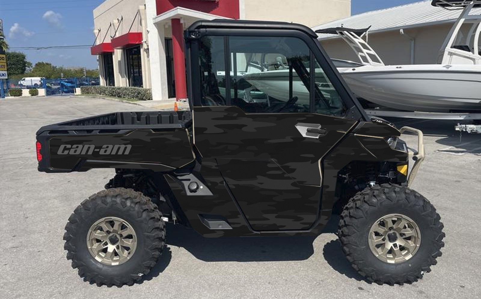 Camo black graphics kit on a Can-Am Defender