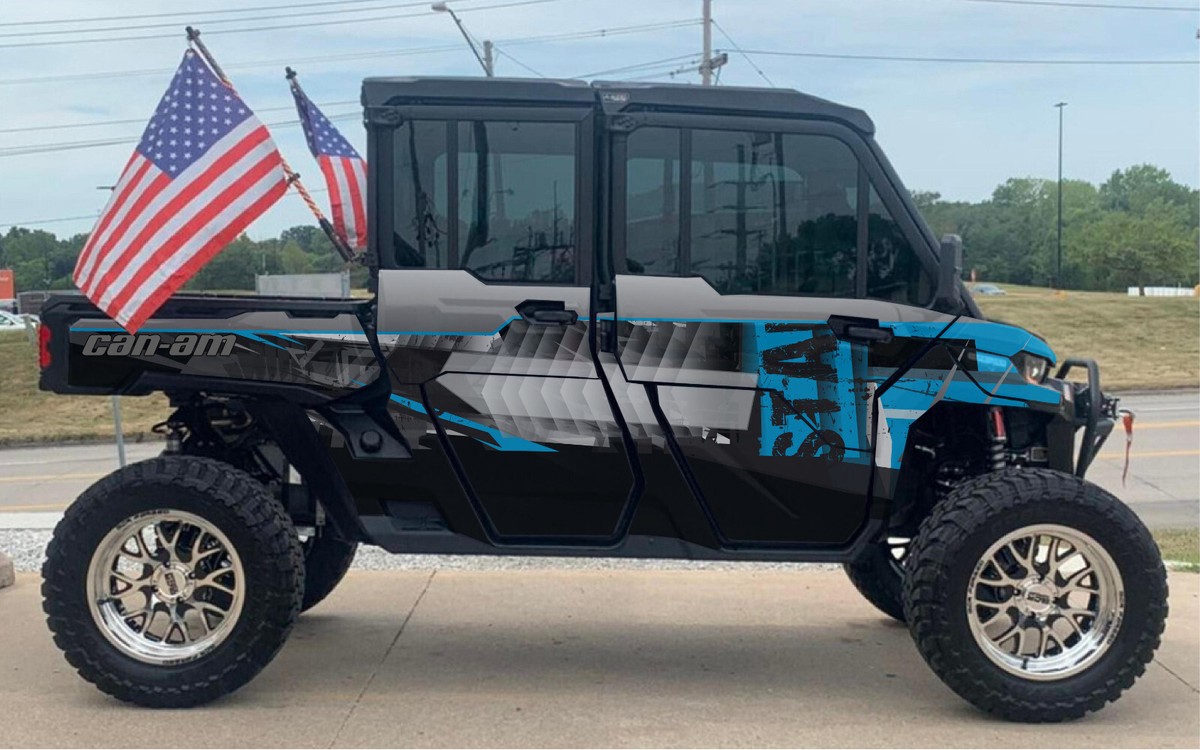 Black Camo - D 2 graphics kit on a Can-Am Defender
