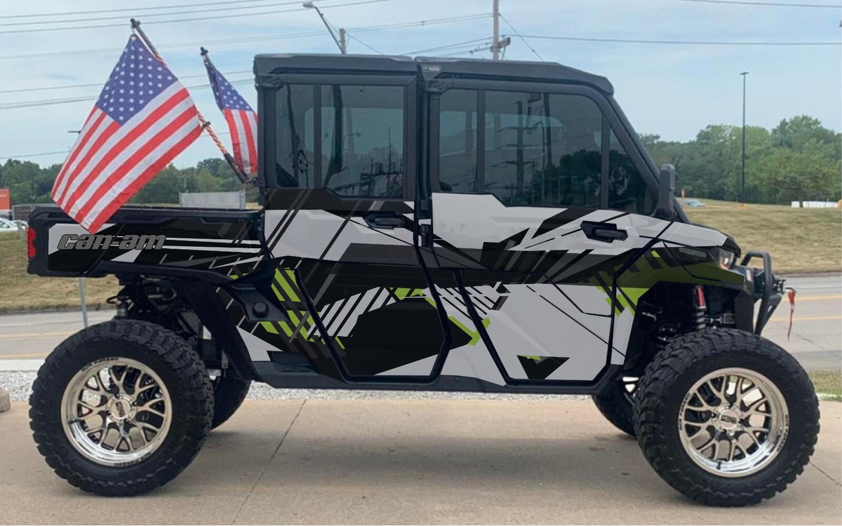 Black Camo - D 3 4 graphics kit on a Can-Am Defender